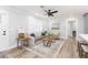 Inviting living room featuring a comfortable sofa, ceiling fan, and neutral decor at 2300 23Rd S St, St Petersburg, FL 33712