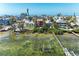 Stunning aerial view of waterfront homes with docks extending into the beautiful turquoise waters at 2306 Canasta Dr, Bradenton Beach, FL 34217