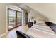 Cozy bedroom with a private balcony and a calming aesthetic at 2306 Canasta Dr, Bradenton Beach, FL 34217