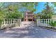Stately home with a private, gated entrance and brick-paved driveway at 2306 Canasta Dr, Bradenton Beach, FL 34217