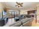Expansive living room featuring hardwood floors and stunning views from the French doors at 2306 Canasta Dr, Bradenton Beach, FL 34217