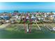 Waterfront home features a private dock, providing direct access to the open bay at 2308 Canasta Dr, Bradenton Beach, FL 34217