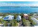 Stunning waterfront homes featuring private docks, lush tropical landscaping, and serene water views at 2308 Canasta Dr, Bradenton Beach, FL 34217