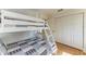 Functional bedroom with a bunk bed and built-in storage, perfect for or guests at 2308 Canasta Dr, Bradenton Beach, FL 34217