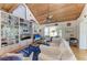 Inviting living room boasts custom built-ins, a fireplace, and an open layout with comfortable seating at 2308 Canasta Dr, Bradenton Beach, FL 34217