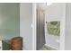 Shower with curtain and towel rack is accessible from the bedroom at 2431 Bayshore Gardens Pkwy # 19, Bradenton, FL 34207