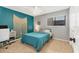 Cozy bedroom features a queen bed, modern ceiling fan, and natural light from the window at 2431 Bayshore Gardens Pkwy # 19, Bradenton, FL 34207