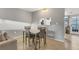 Cozy dining room featuring a modern table set and natural light, perfect for Gathering meals and entertaining at 2431 Bayshore Gardens Pkwy # 19, Bradenton, FL 34207