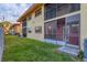 Building exterior showing a screened in patio and well-maintained lawn at 2431 Bayshore Gardens Pkwy # 19, Bradenton, FL 34207