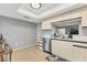 Clean kitchen with modern cabinets and a stainless steel dishwasher at 2431 Bayshore Gardens Pkwy # 19, Bradenton, FL 34207