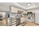 Well-maintained kitchen featuring ample cabinet space and durable tile flooring at 2431 Bayshore Gardens Pkwy # 19, Bradenton, FL 34207