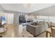 Inviting living room with a comfortable sofa, a view to the patio, and stylish decor at 2431 Bayshore Gardens Pkwy # 19, Bradenton, FL 34207
