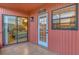 Outdoor patio area with glass door and access to Snowbarger st at 2431 Bayshore Gardens Pkwy # 19, Bradenton, FL 34207