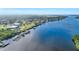 Beautiful waterfront community with private boat docks on a scenic river under a sunny sky at 28960 Gin Ln, Punta Gorda, FL 33982