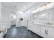 Modern bathroom with a glass-enclosed shower, double vanity, and sleek finishes for a luxurious feel at 28960 Gin Ln, Punta Gorda, FL 33982