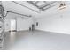 Spacious three car garage with epoxy flooring at 28960 Gin Ln, Punta Gorda, FL 33982