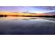 Picturesque sunset view with colorful sky reflected on calm waters, creating a serene ambiance at 28960 Gin Ln, Punta Gorda, FL 33982