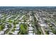 Well-maintained community featuring mature trees and lush green grass at 3278 Village Green Dr # 1024, Sarasota, FL 34239