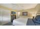 Relaxing bedroom showcases fan, large closet, and light yellow walls for a warm inviting space at 3278 Village Green Dr # 1024, Sarasota, FL 34239