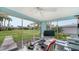 Bright office space with large windows overlooking a well-manicured lawn and neighborhood view at 3278 Village Green Dr # 1024, Sarasota, FL 34239