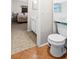 A bright bathroom with built-in shelving and tile flooring throughout at 3300 Loveland Blvd # 3203, Punta Gorda, FL 33980