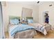 Comfortable bedroom featuring two twin beds and a neutral color scheme, perfect for relaxation at 3300 Loveland Blvd # 3203, Punta Gorda, FL 33980