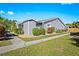 Attractive home with a well-maintained lawn, neat landscaping, and inviting walkway at 3300 Loveland Blvd # 3203, Punta Gorda, FL 33980