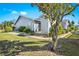 Charming home featuring manicured landscaping, a well-maintained lawn, and inviting curb appeal at 3300 Loveland Blvd # 3203, Punta Gorda, FL 33980