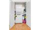A conveniently located laundry closet featuring a stacked washer and dryer unit at 3300 Loveland Blvd # 3203, Punta Gorda, FL 33980