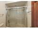 Bathroom features a glass-enclosed tub with a shower head at 3837 Torrey Pines Blvd, Sarasota, FL 34238