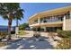 Large, open clubhouse with expansive windows and a welcoming entrance at 3837 Torrey Pines Blvd, Sarasota, FL 34238