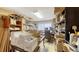 Room with boxes, shelves, filing cabinet, and desk at 3837 Torrey Pines Blvd, Sarasota, FL 34238
