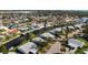 Aerial view of waterfront homes with boat docks along canals in a residential neighborhood at 4721 Mount Vernon Dr, Bradenton, FL 34210