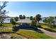 Picturesque gazebo by the water, with a picnic table, palm trees, and clear skies providing scenic views at 4721 Mount Vernon Dr, Bradenton, FL 34210