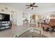 Spacious living room features ample seating, modern decor, and seamlessly connects to other rooms at 4721 Mount Vernon Dr, Bradenton, FL 34210