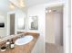 Well-lit bathroom with a neutral color scheme and a classic vanity at 4822 Ocean Blvd # 2D, Sarasota, FL 34242
