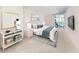 Bright bedroom with a comfortable bed and access to a private balcony at 4822 Ocean Blvd # 2D, Sarasota, FL 34242