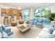 Inviting living room with lots of natural light and a view of the water at 4822 Ocean Blvd # 2D, Sarasota, FL 34242