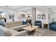 Bright lounge area with comfortable seating, open kitchen, and modern decor provide an inviting space at 4822 Ocean Blvd # 2D, Sarasota, FL 34242