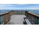 Picturesque pier featuring a bench and railings overlooking the water, perfect for fishing and enjoying the scenery at 4822 Ocean Blvd # 2D, Sarasota, FL 34242