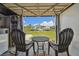 Outdoor seating area provides views of the waterway and docks at 4912 Beacon Rd, Palmetto, FL 34221