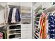 Organized walk-in closet with shelving and rods for clothes and storage, with plenty of space at 525 S Shore Dr, Osprey, FL 34229