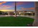 Stunning home featuring a well-manicured lawn and a circular driveway enhancing its curb appeal at 525 S Shore Dr, Osprey, FL 34229