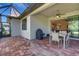 A spacious outdoor patio for dining and relaxing, perfect for enjoying outdoor living at 5946 Caspian Tern Dr, Sarasota, FL 34238