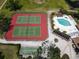 Aerial view of tennis courts, swimming pool, shuffleboard and recreation area at 6071 Fairway Ln # 1424, Bradenton, FL 34210