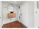 Entryway with tile flooring, coat closet, and modern mirror at 6071 Fairway Ln # 1424, Bradenton, FL 34210