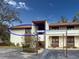 Two-story condo building with carports and landscaping at 6071 Fairway Ln # 1424, Bradenton, FL 34210
