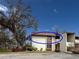 Exterior view of the side of the property with a partial view of the roof at 6071 Fairway Ln # 1424, Bradenton, FL 34210