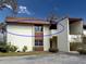 Cream-colored two-story condo building at 6071 Fairway Ln # 1424, Bradenton, FL 34210