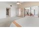 Spacious main bedroom with access to the porch and an en-suite bathroom with shower at 6071 Fairway Ln # 1424, Bradenton, FL 34210